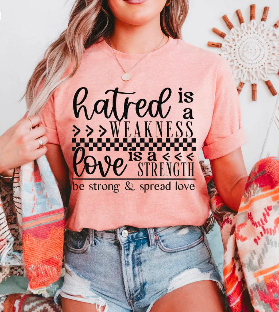 Hatred is a weakness love is a strength tee/sweatshirt