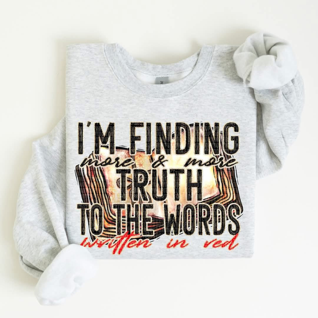 Words written in red tee/sweatshirt