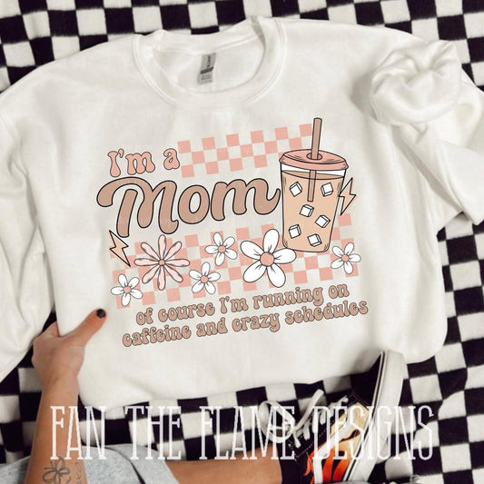 I'm a … of course I'm running on caffeine and crazy schedules tee/sweatshirt