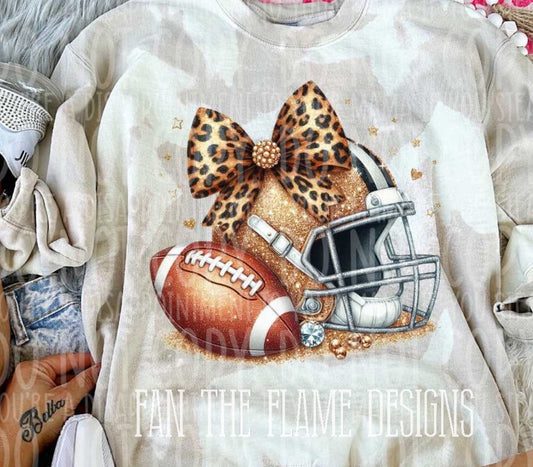 Football and helmet with bow (vintage) tee/sweatshirt